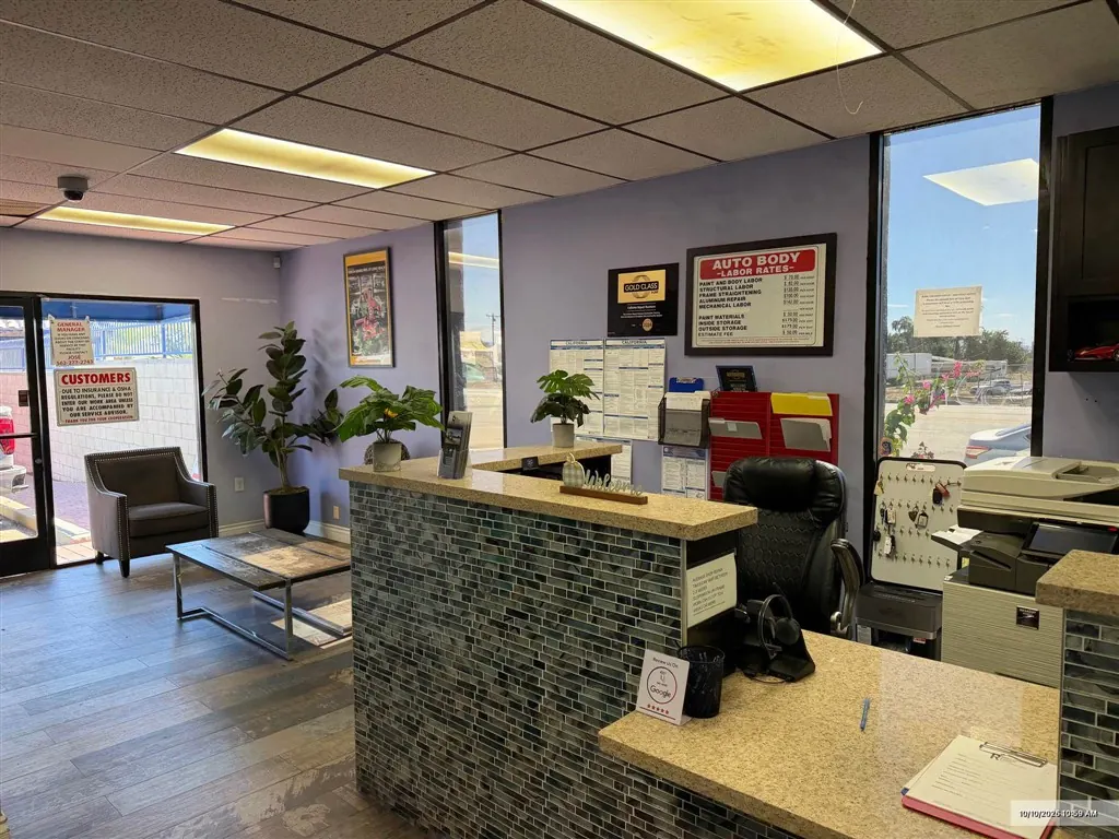 Front desk and customer lobby at Royal Collision Center in Fontana, CA